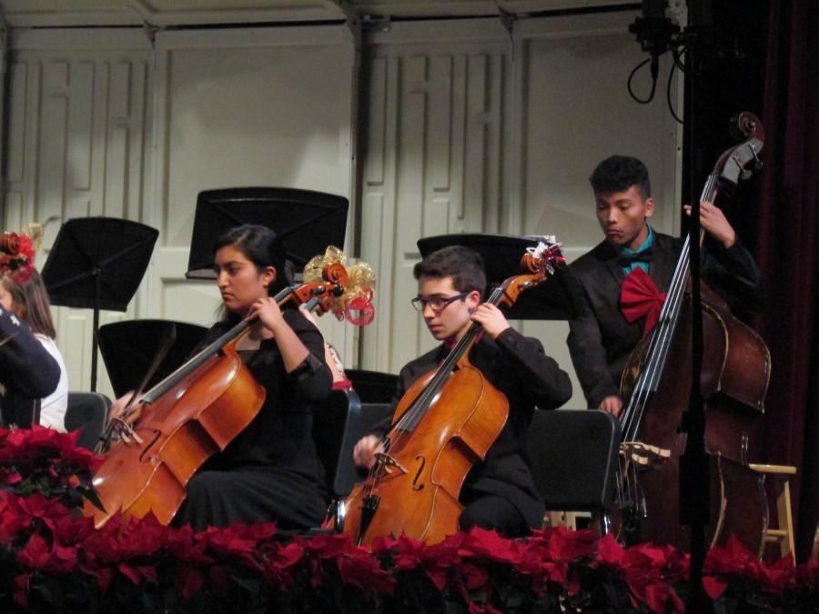 The orchesta concert took place on Dec. 14.  Senior cellist Vanessa Hasbun, sophomore cellist Jack Gillespie, and senior bassist Jaime Marban. 