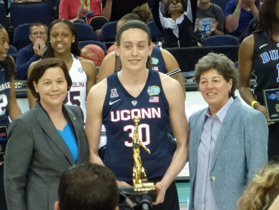 Breanna Stewart receiving the Wade Trophy, an award given to the best woman player in the NCAA. Stewart has won the trophy twice. 