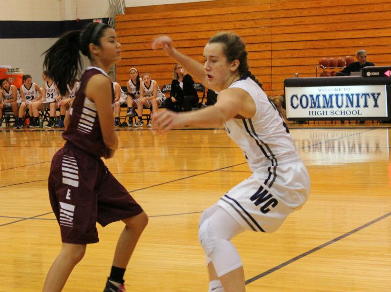 Junior Sierra Koenig goes after the ball before getting injured in the game against Elgin. The team won 54-22 Tuesday.
