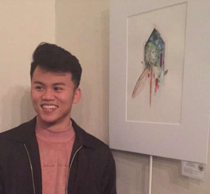 Truong and his piece “The Little Fairy” which placed third in mixed media. [Photo courtesy of Yori Alacorn]