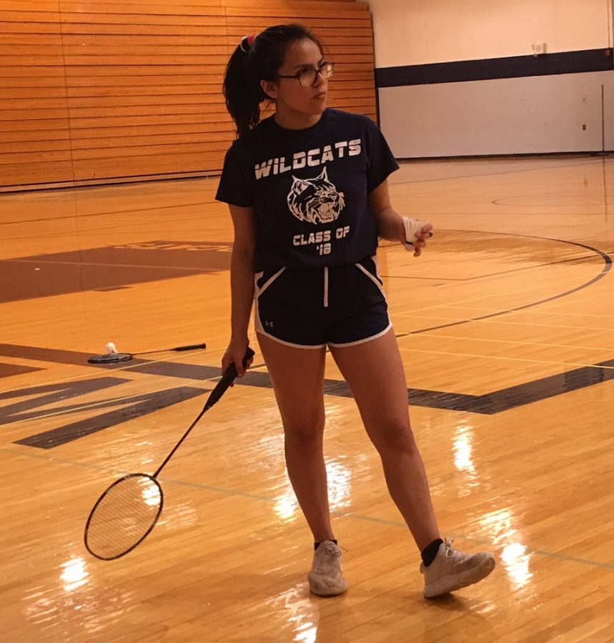 Badminton team captain Clarissa Vargas practices with her team in the Bishop gym.
