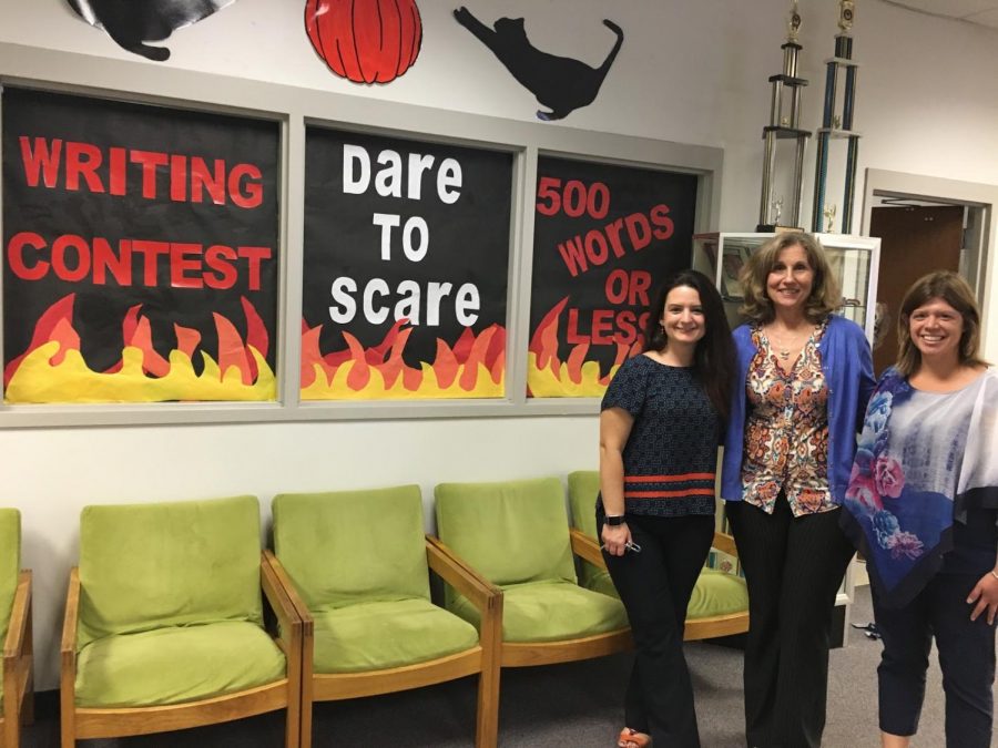 The+Dare+to+Scare+contest+is+now+open+and+students+can+submit+their+stories+to+their+English+teacher+or+the+LRC.+From+left%2C+language+arts+teacher+Tara+Deleon%2C+library+media+specialist+Donna+Leahy%2C+and+career+and+technical+education+teacher+Brittney+Bauer+will+take+part+in+the+event.