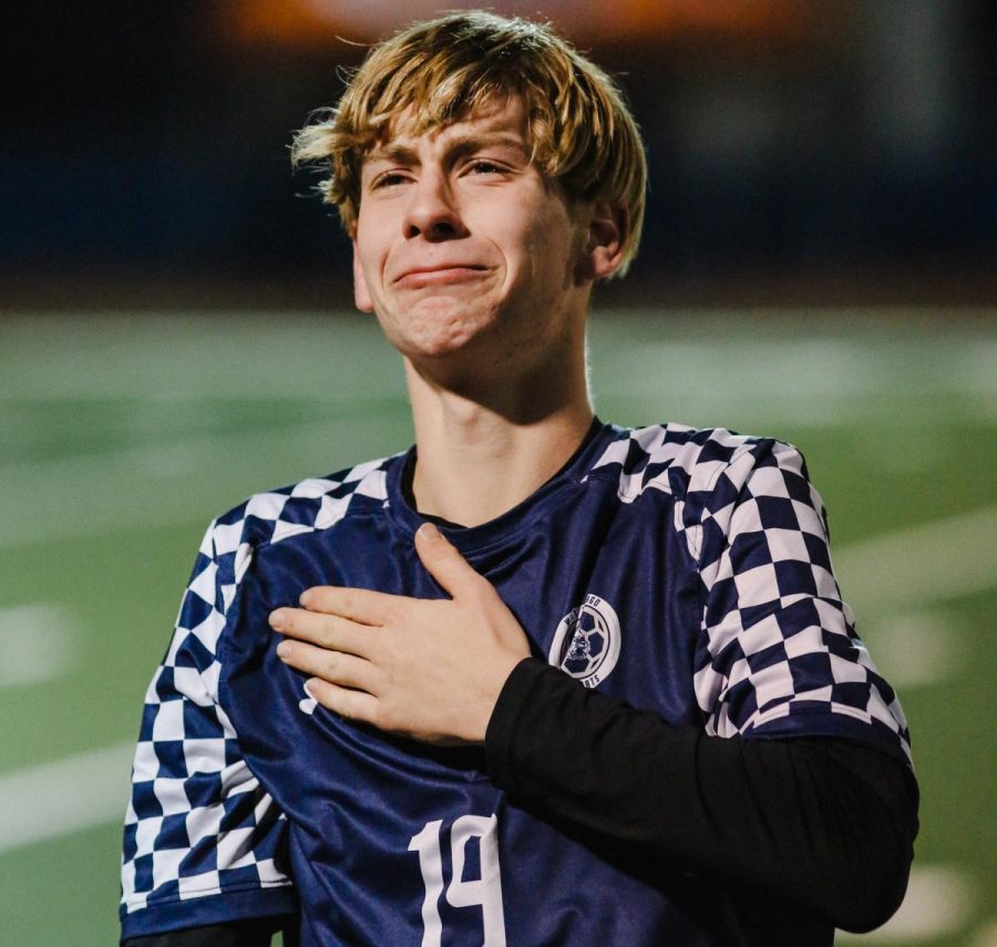 Boys varsity soccer player Lukas Stary becomes emotional after the team wins the Class 3A Championship. This was Stary’s first time playing on the team. 