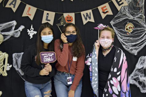 WeGo Global members Shantal Correa, Mariana Lopez and Ally Krause in front of the photo booth.