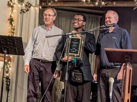 It was a historic event at Glen Arbor Community Church when AWANA Commander Mike Eichin (left), along with Missionary Ken Krup (right), presented the Citation Award to Charles Johnson III.