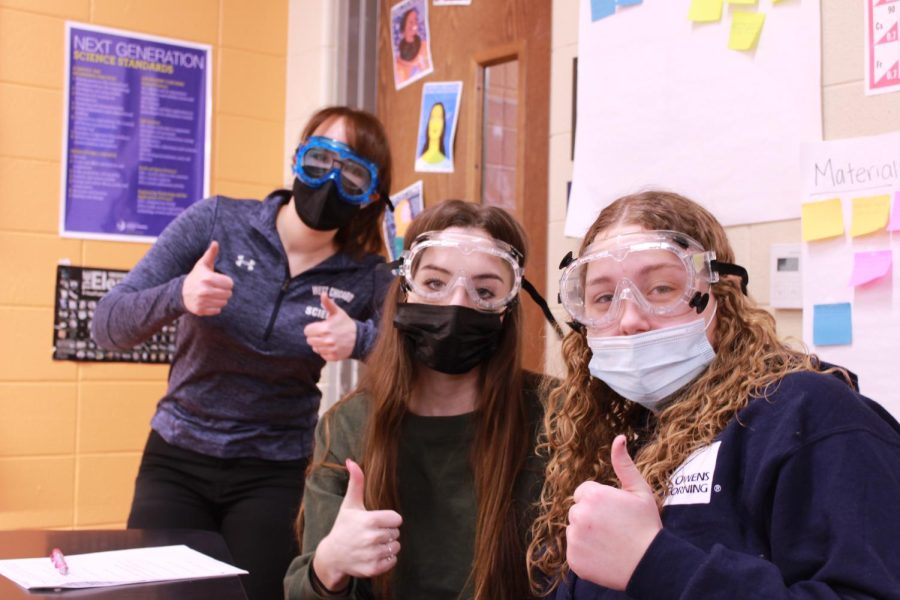 Science teacher Anna Fulmer and two students wear masks as per the current COVID-19 guidelines in place at WEGO.