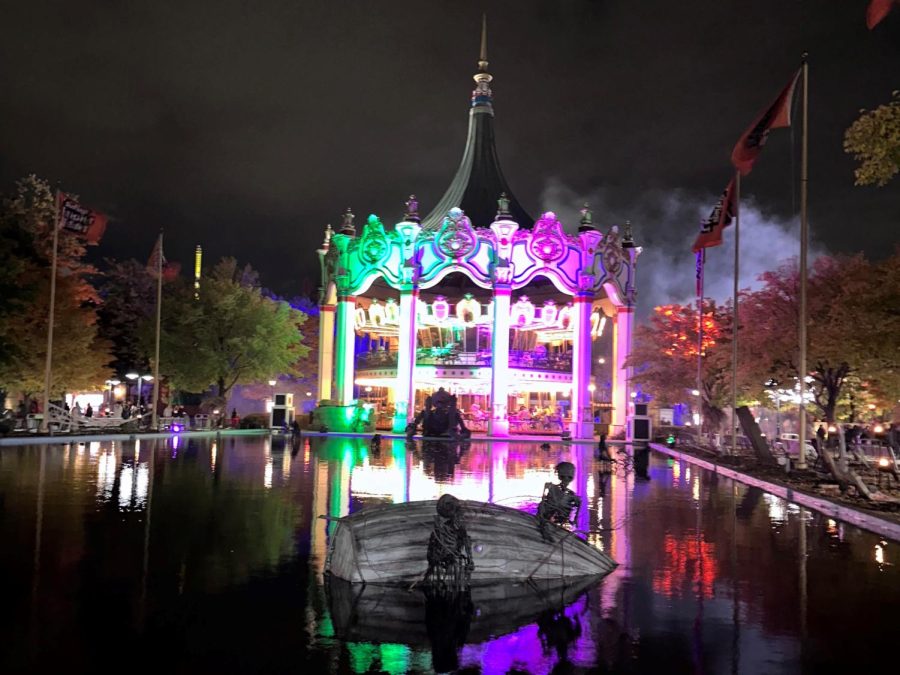 The pool just below the carousel is dyed for Halloween each year, and the lights are changed from bright white to green and purple.