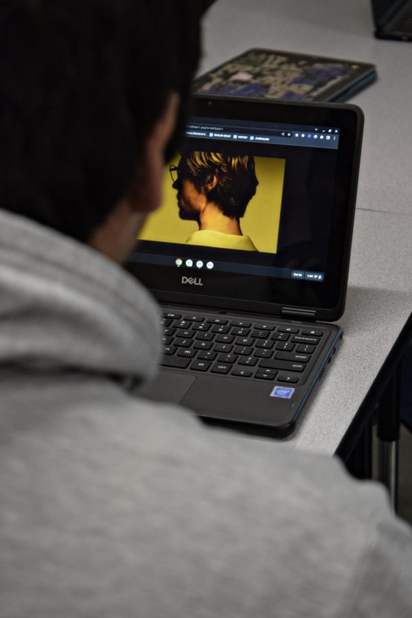 A student watches Dahmer – Monster: The Jeffrey Dahmer Story in an English classroom on Oct. 26.