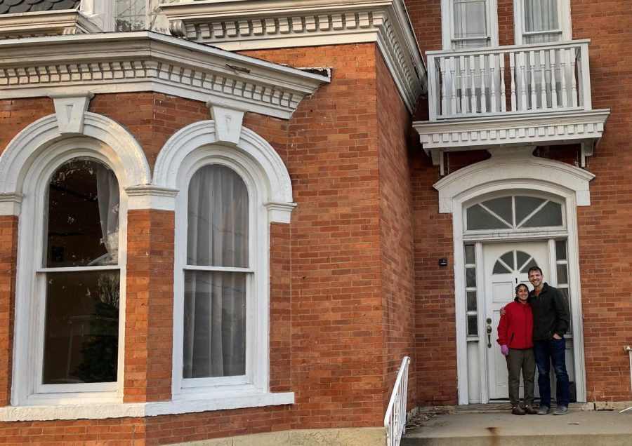 Neha and Matt Myers stand outside the newly-purchased Wiant House in West Chicago in December 2022.
