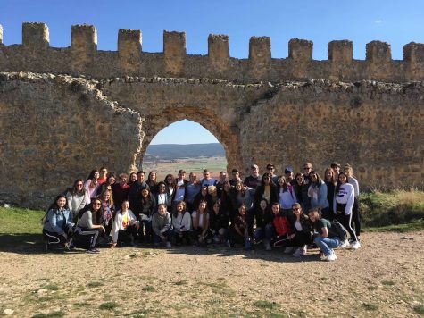 WeGo students from the 2019 exchange program pose in front of Castillo de Gormaz with their hosts. (Photo by Sarah Gill)