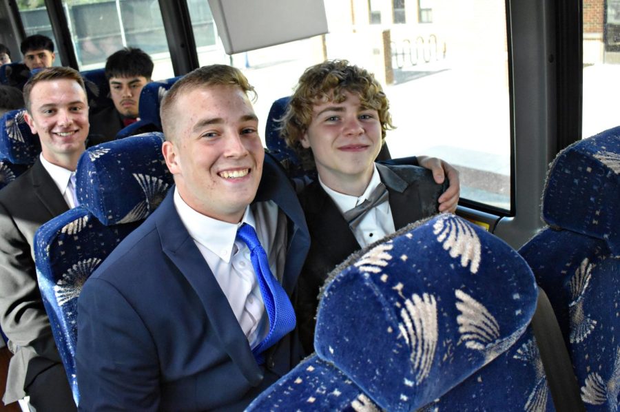 Seniors Gannon Hosticka and Justin Zbinovec find seats on the bus.