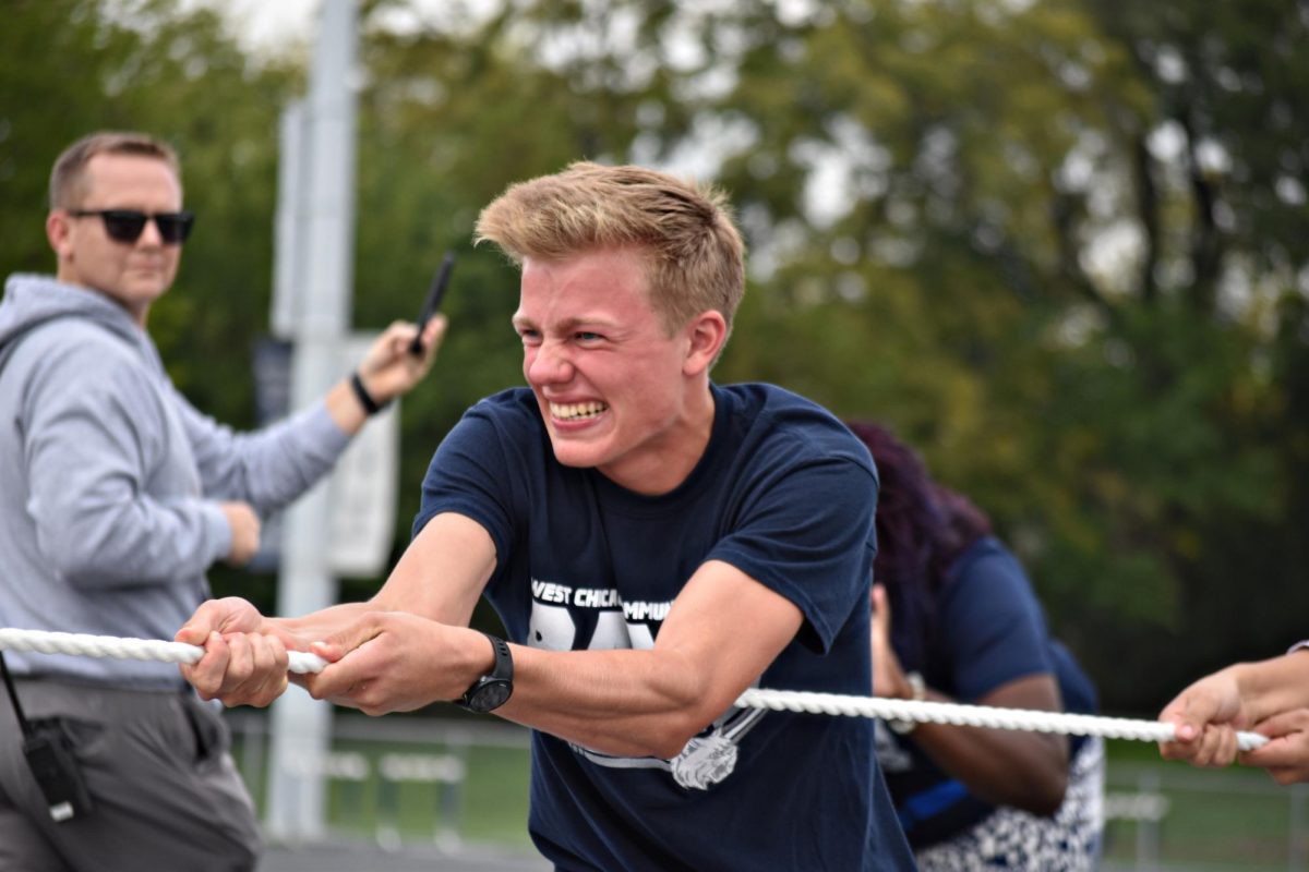 Junior Zachariah Williamson gives his all during the tug-of-war challenge.