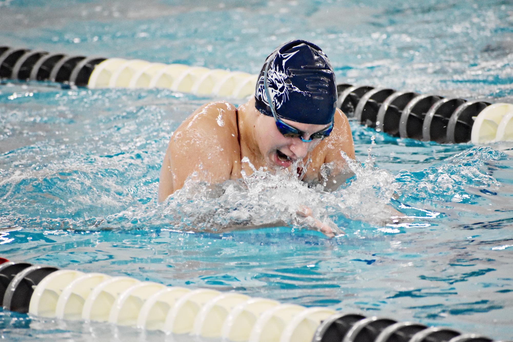 Keeping her line tight, sophomore Audrey Lindstrom from Batavia races in the breaststroke.