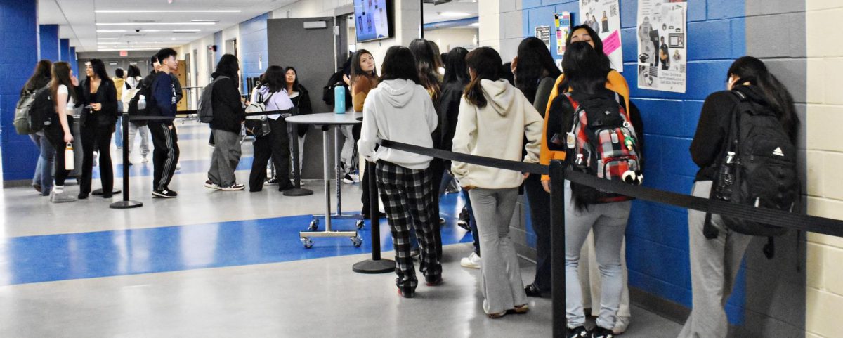 West Chicago students wait to be let into the cafeteria after the new lunchroom procedures are put in place. Only 20-25 students at a time are allowed to enter.