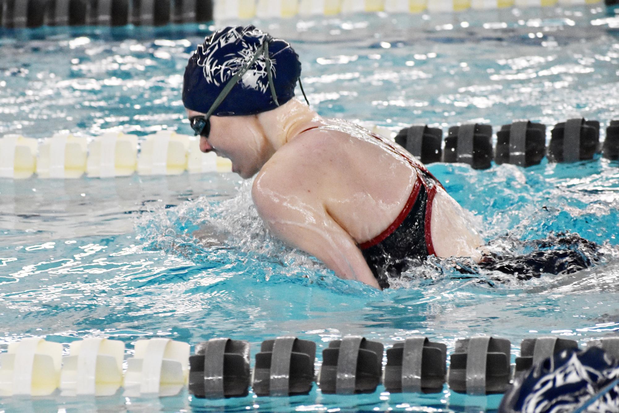 Senior Hollyn Ambre, a student at Batavia High School, works on her breaststroke during practice.