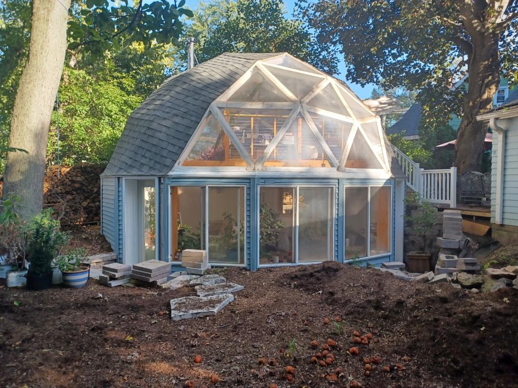 The greenhouse structure that the Boveys have built in their backyard for fostering different plants. 