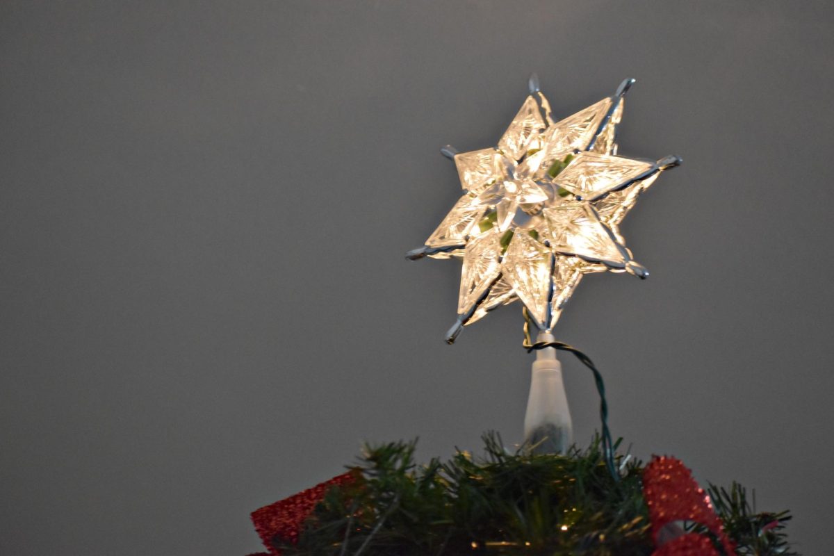 The Christmas star shines over the Naperville river walk in December 2023.