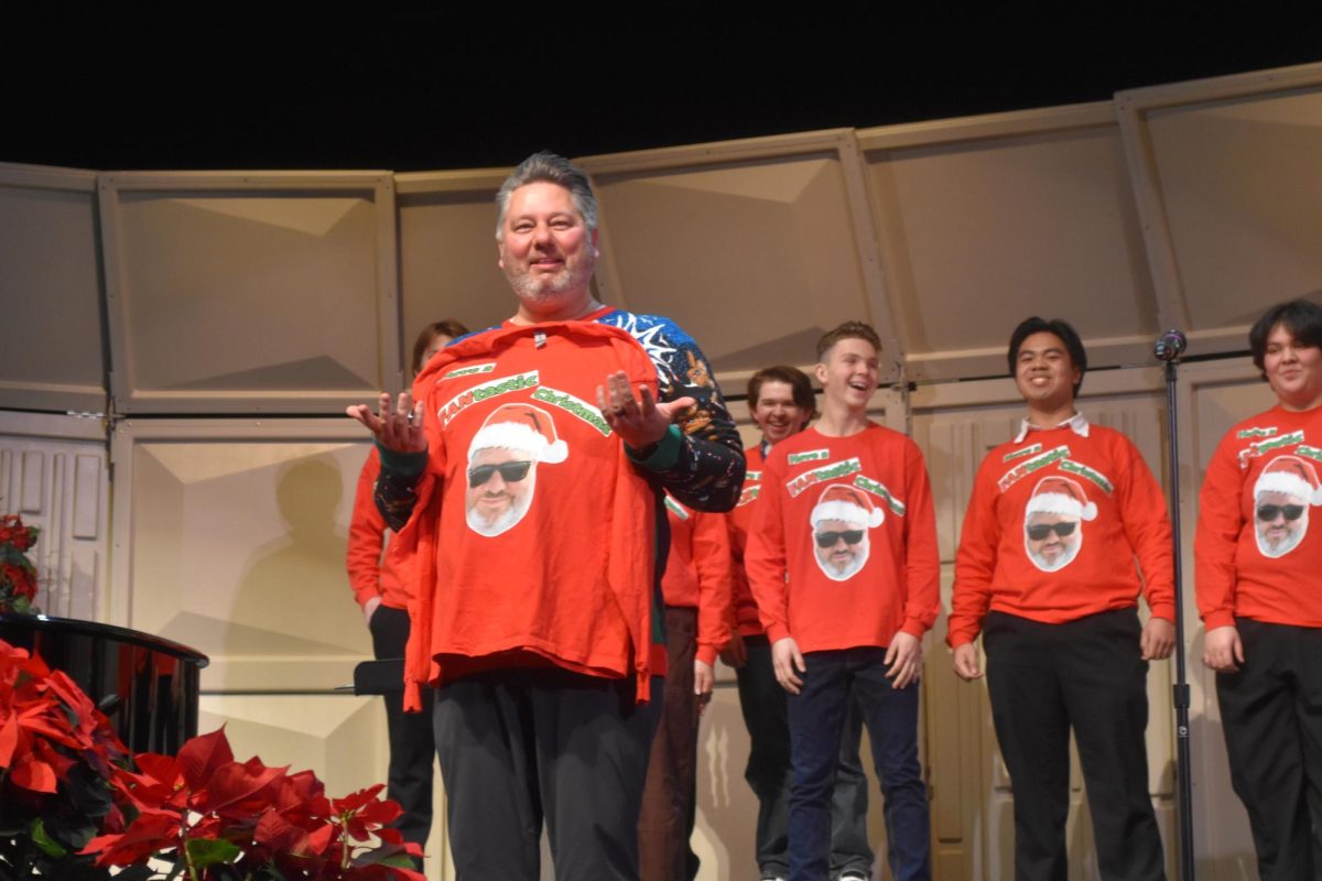 Men in Concert Choir surprised Music Teacher Fantozzi with a shirt with his face on it! Have a FanTastic Christmas 