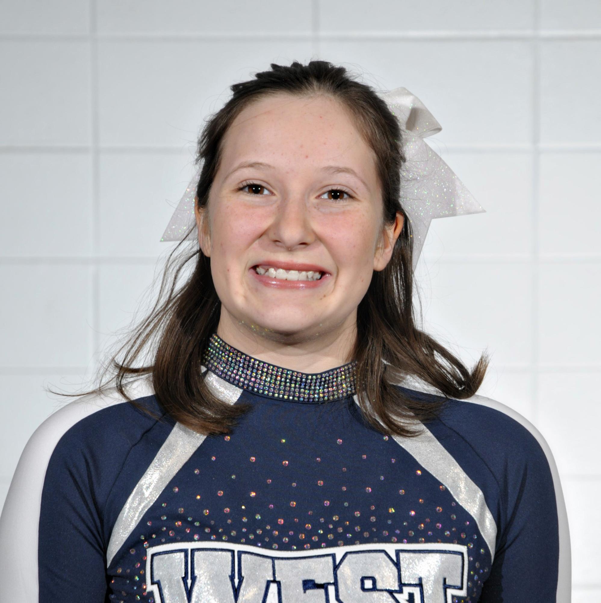 Amelia Hudson has found this season of cheer to be fun, despite an injury that placed her on the sideline. (Photo courtesy of Lifetouch)