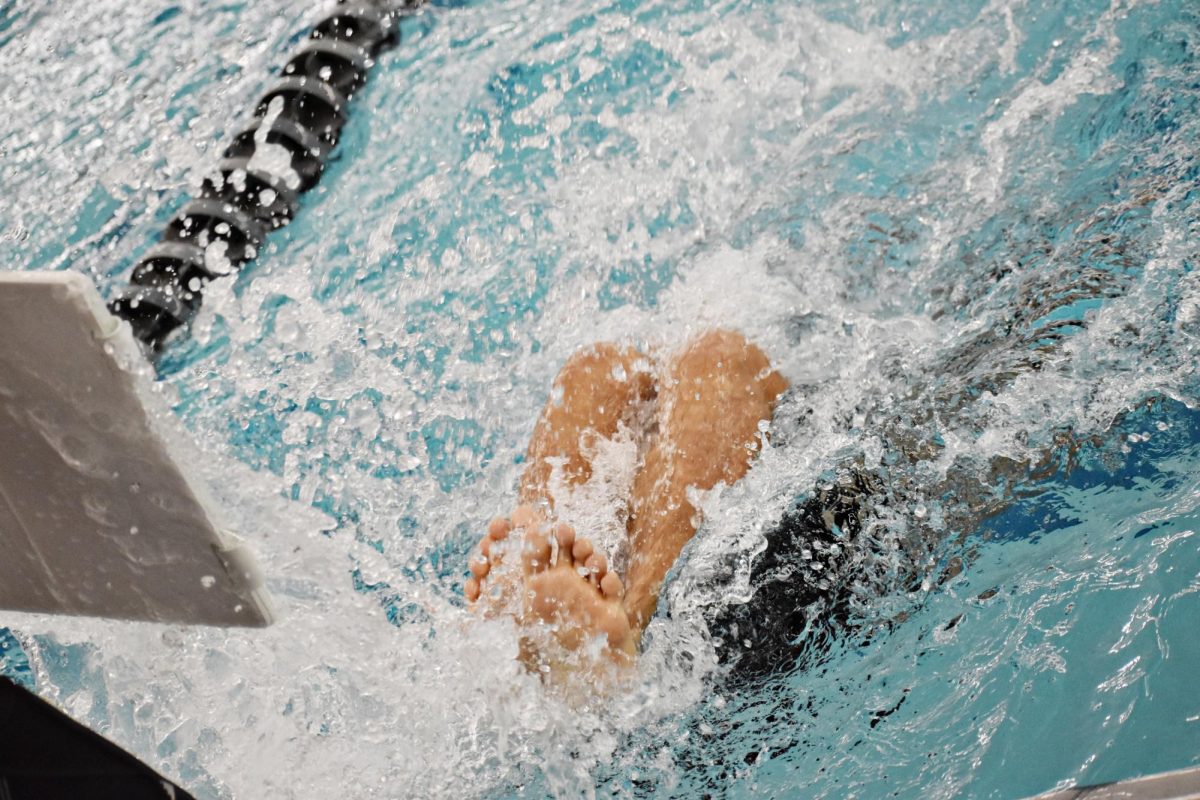 Sophomore Nery Banuelos Cabral takes a flip turn during the 500-yard freestyle.