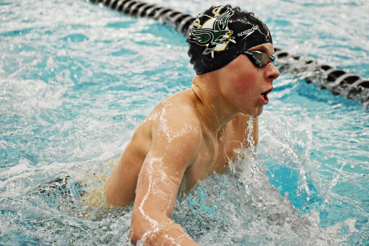 A Bartlett Saber Hawks athlete cuts through the waters surface.