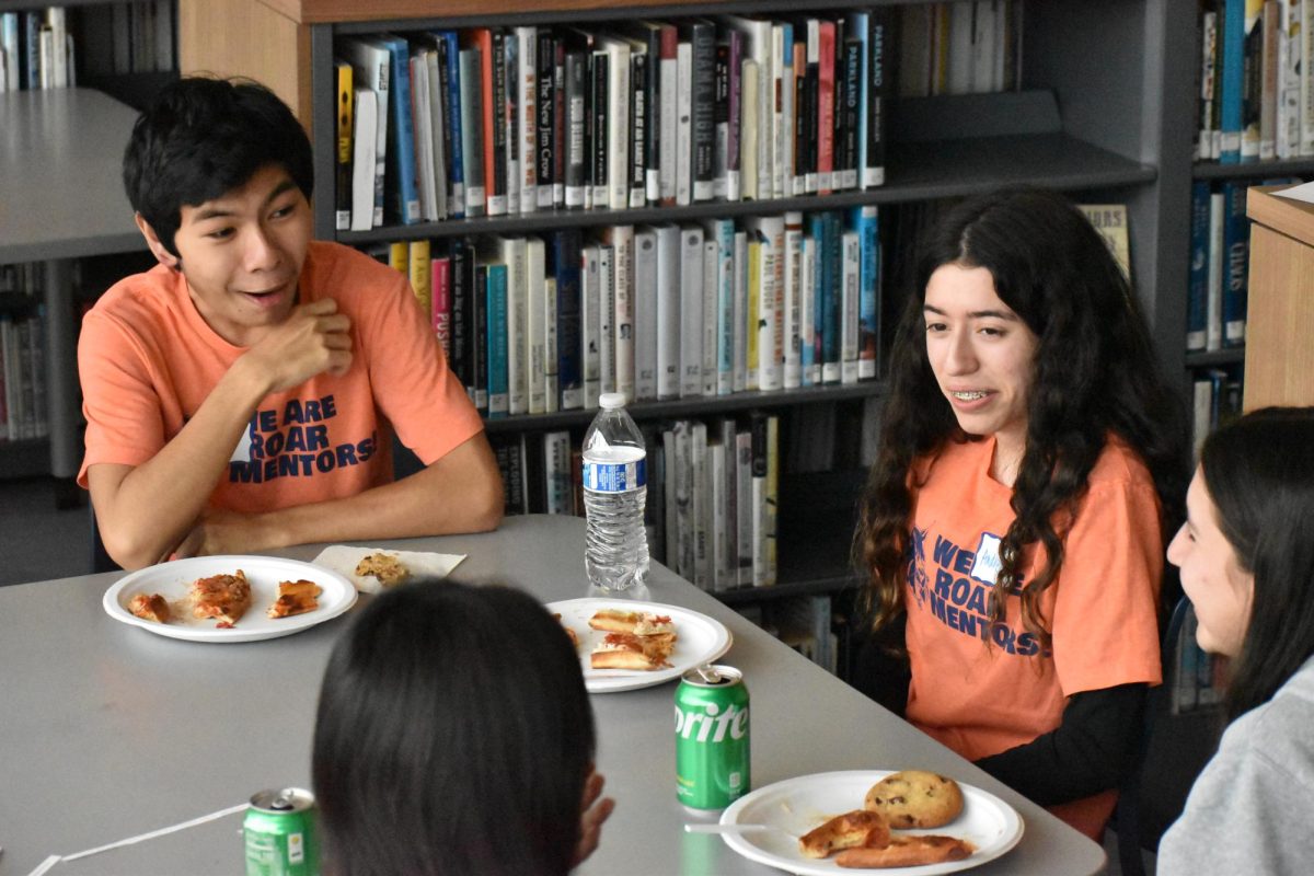 Mentors and students are given lunch options of pizza, vegetables, salad, cookies, and plenty of snacks.