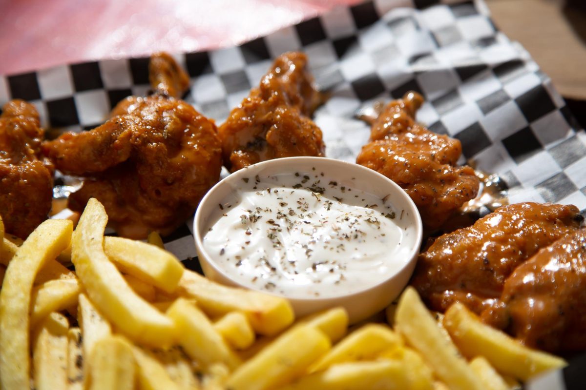 Takeout wings are convenient and delectable. (Royalty-free photo by Zabdi Onan-Caceres via Pexels)