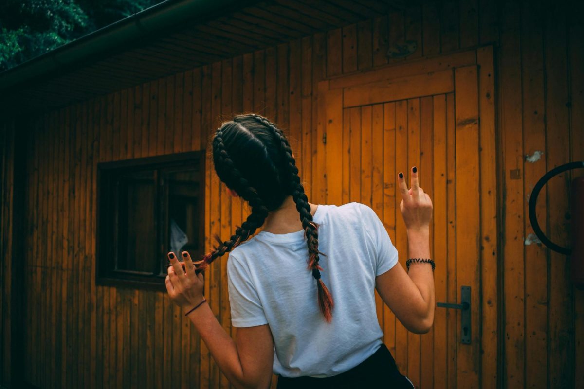 French braids can be a versatile hairstyle at any age. (Royalty-free photo by Rudy Kirchner via Pexels)