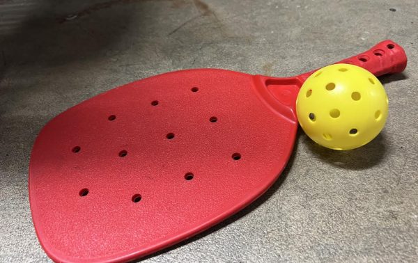 Pickleball includes the use of a ping-pong-esque paddle, and a ball that looks more like a wiffle ball. 