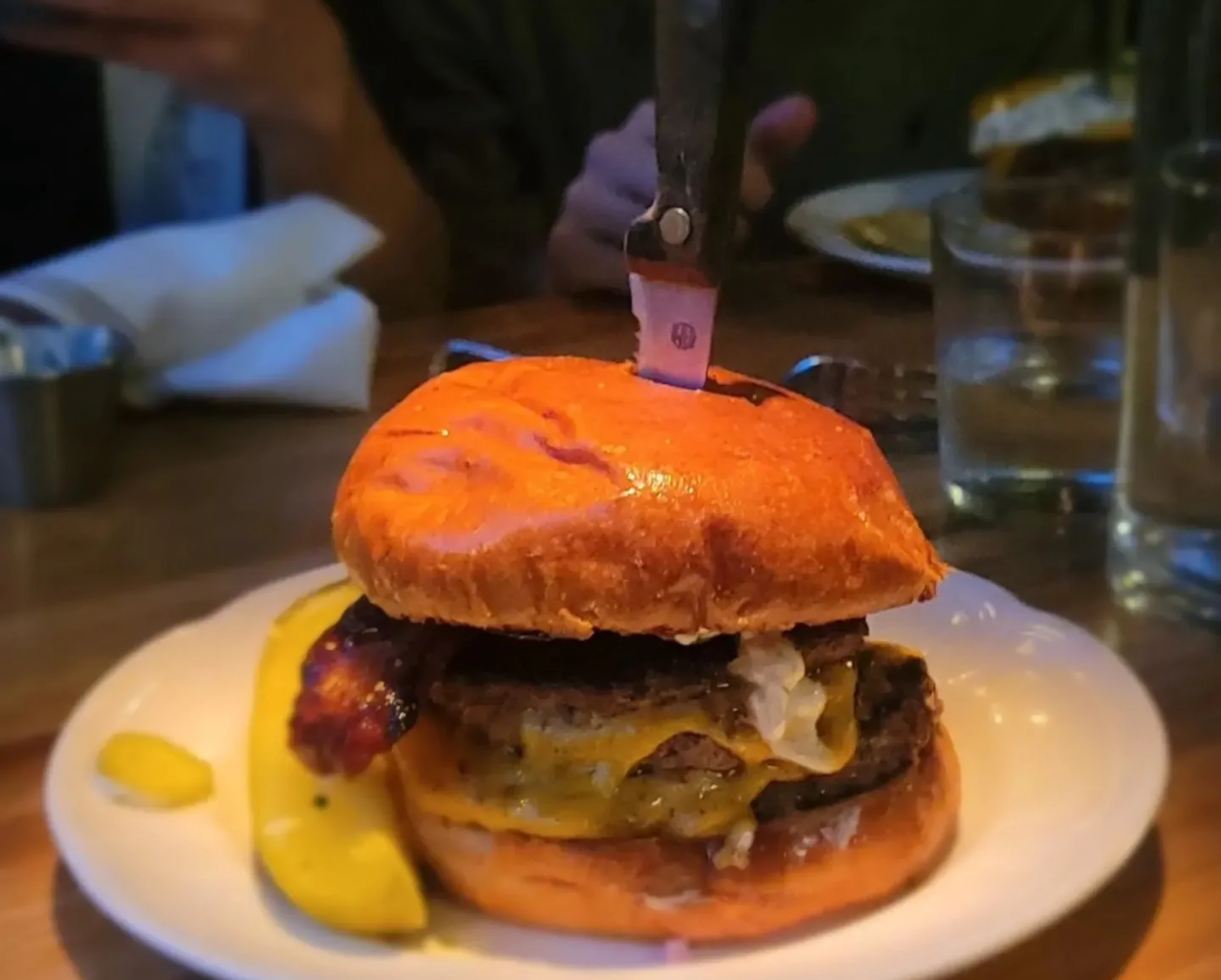 The burger from Au Cheval in Chicago is plump, juicy, and tasty. 