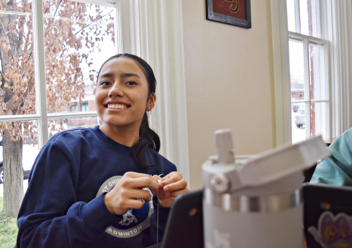 Sophomore Valeria Ballines tries some of the pastries available at Cocoa Notes Bakeshop in March 2024.