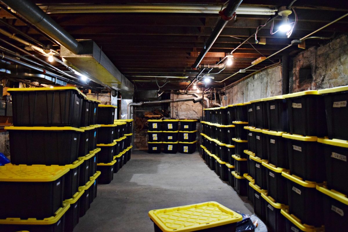 The basement of The Whistle Stop, which contains numerous bins full of clothes that can be purchased at whistlestopvtg.com.