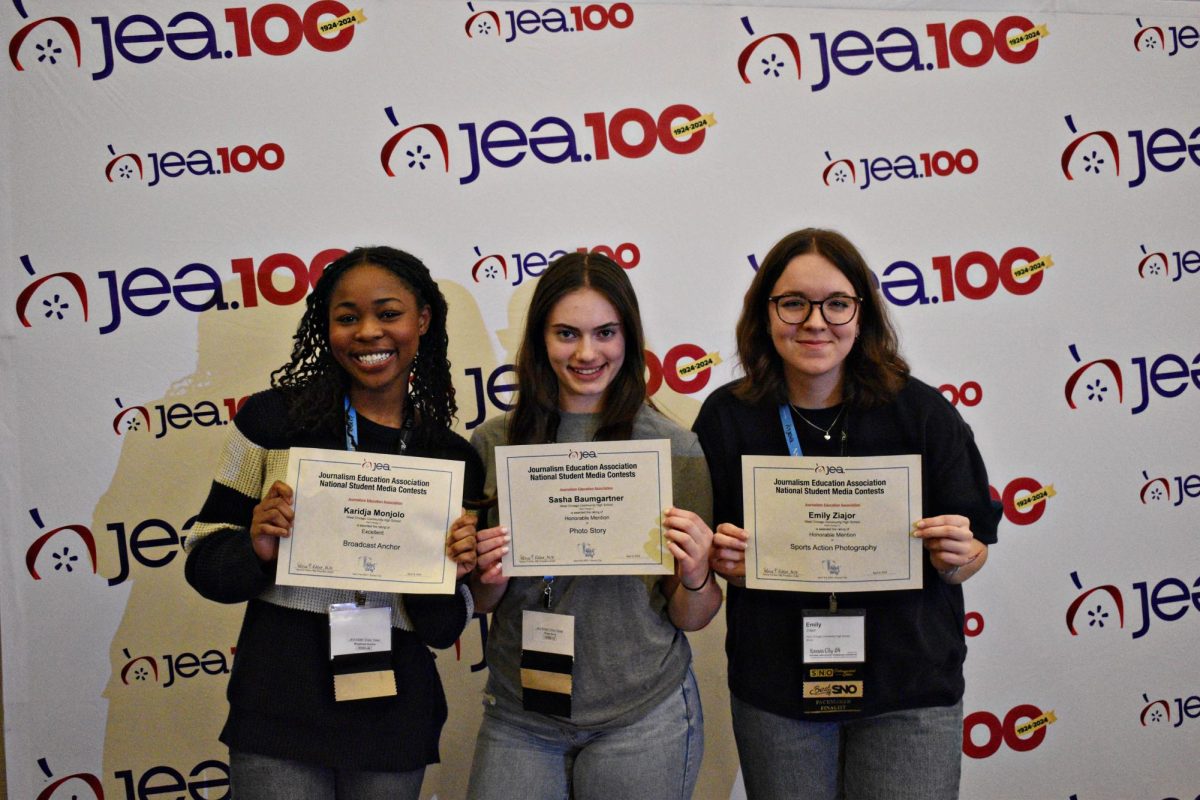 Monjolo, Baumgartner and Ziajor after placing in their student media contests. 
