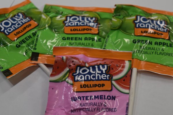 Jolly rancher lollipops come in four different flavors: green apple, watermelon, cherry and pink lemonade.