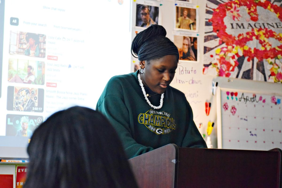 Her heartbreaking poem communicated hope and resilience: Qamaree Williams reads to the class on March 24.