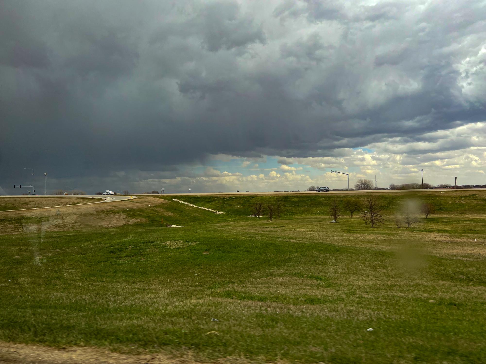 Huge storm clouds form over I-80 in Polk County, Iowa.