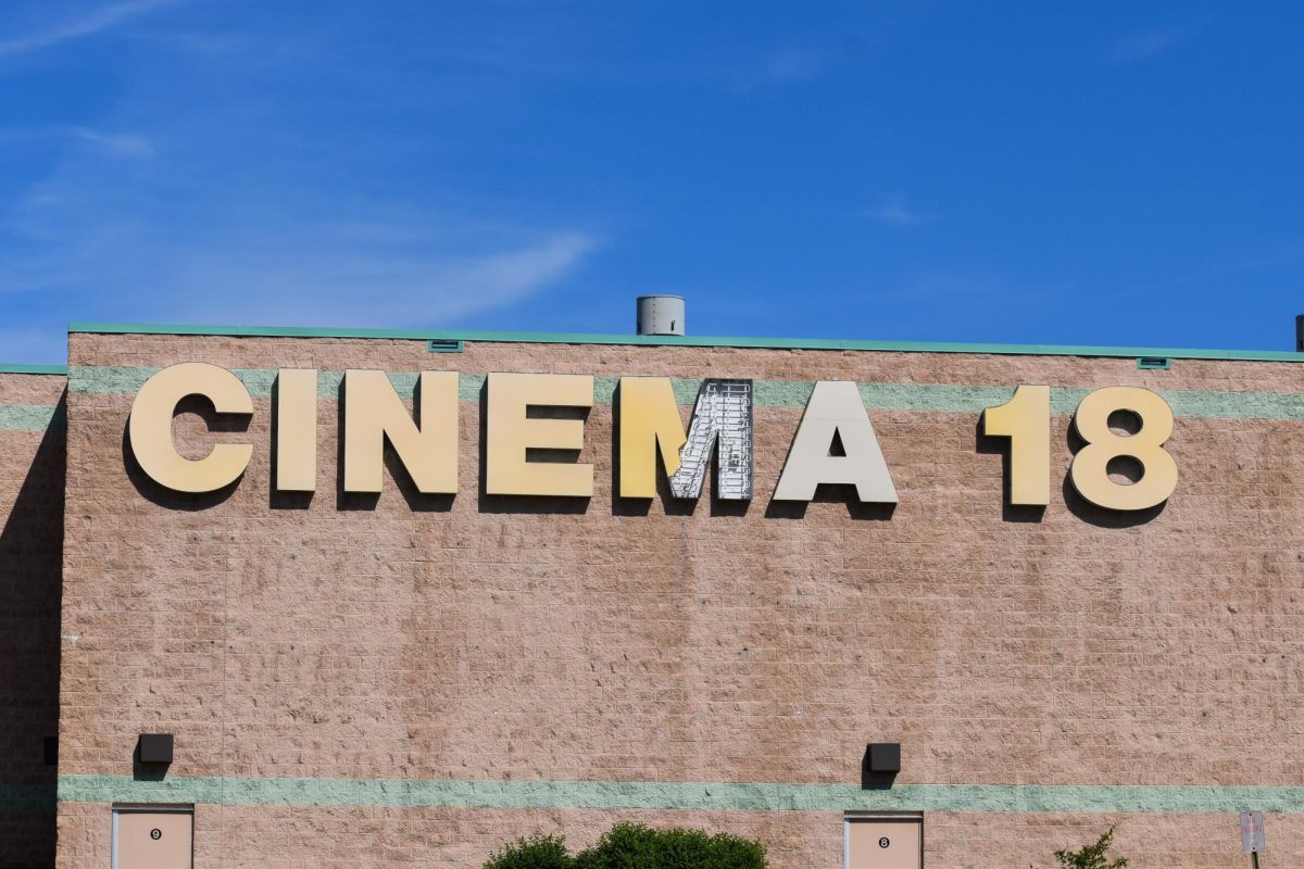 Decaying sign of one of the remaining business, Cinema 18 still operating within the mall