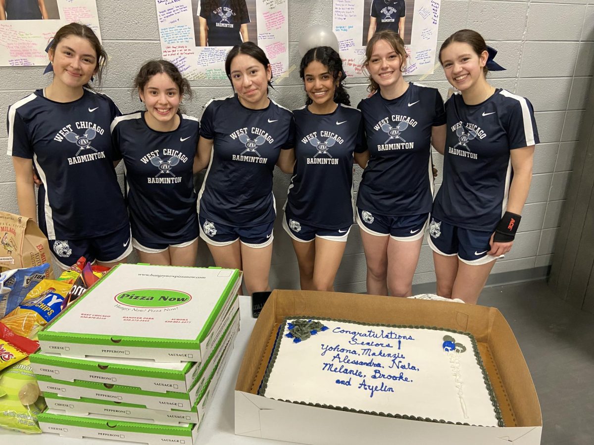 There was pizza and cake for the team to enjoy with the seniors. (Photo courtesy of Emily Brown). 