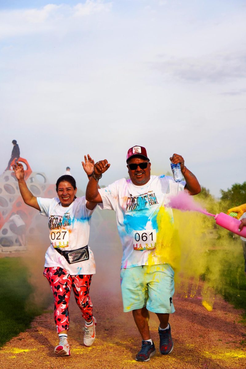 Participants are showered with colored powder during last years event. (Photo courtesy of Sara Witteck)