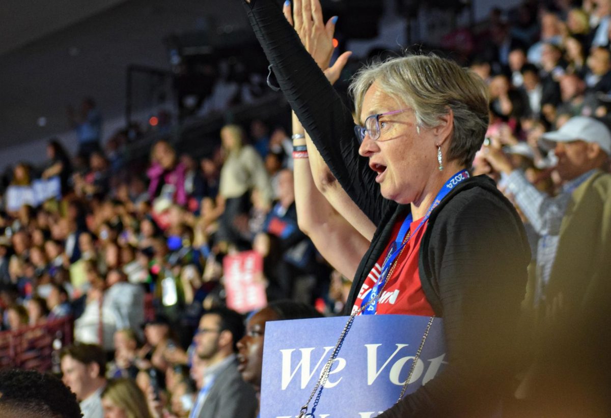 Supporters cheer on former Secretary of State Hillary Clinton as she delivers her opening night speech at the Democratic National Convention in Chicago.