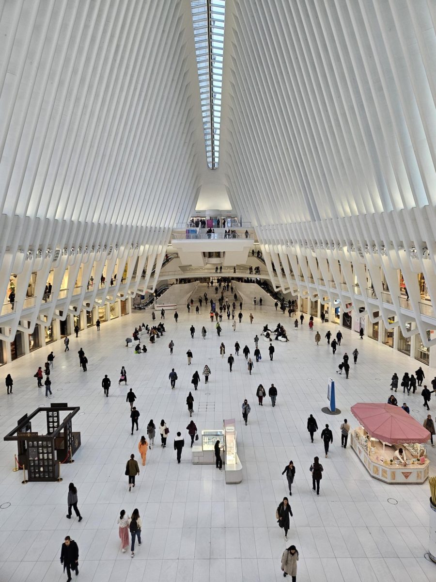 Visitors walk through the expansive main corridor in the 9/11 Memorial and Museum in New York.