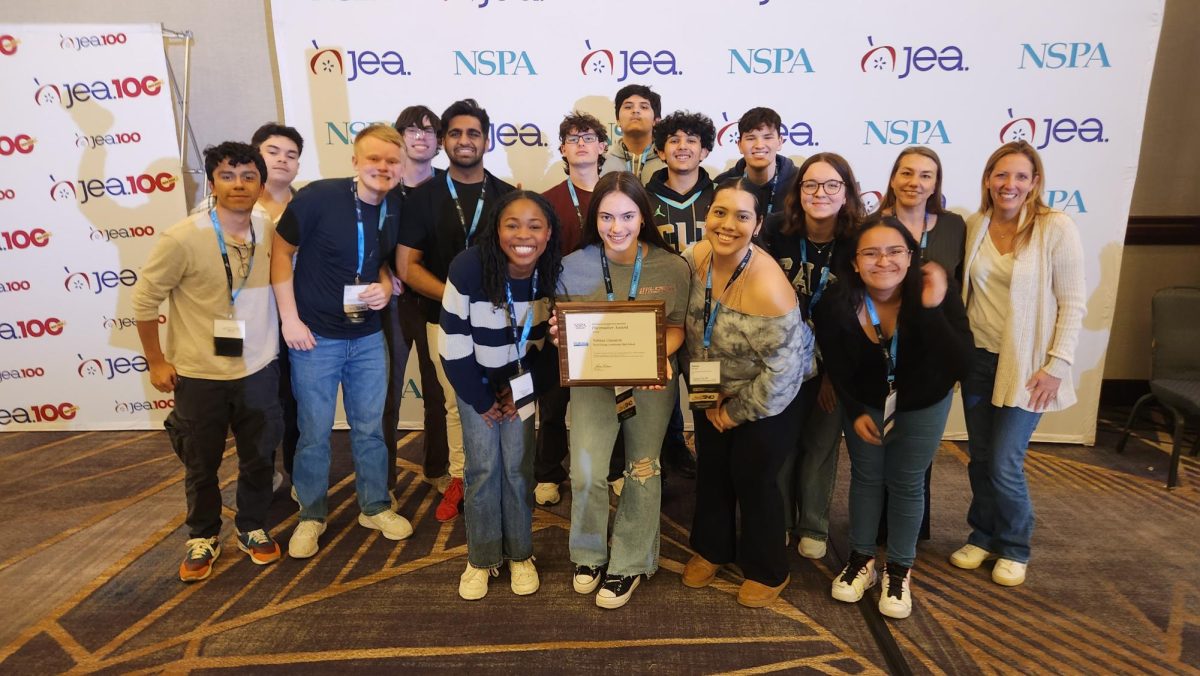 Fireman with the award-winning Wildcat Chronicle team in April 2024, at the JEA National High School Journalism Convention in Kansas City. (Photo courtesy of Leslie Fireman)