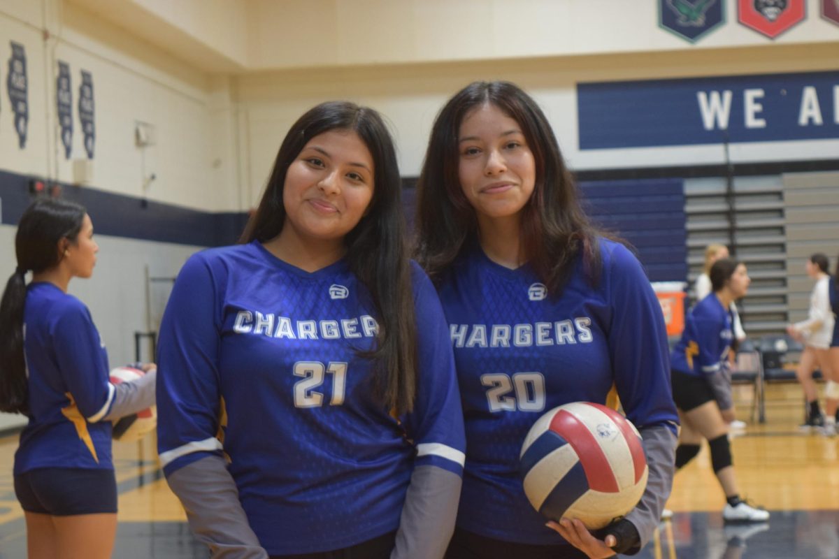 Warm-up partners Hensley Jimenez (left) and Nataly Carillo (right) practice their skills in order to perform their best. 