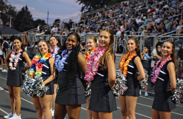 Members of WCCHS' dance team wear leis on Beach Day earlier this football season. Beach Day is a popular theme, not just at West Chicago Community High School, but across the nation. 