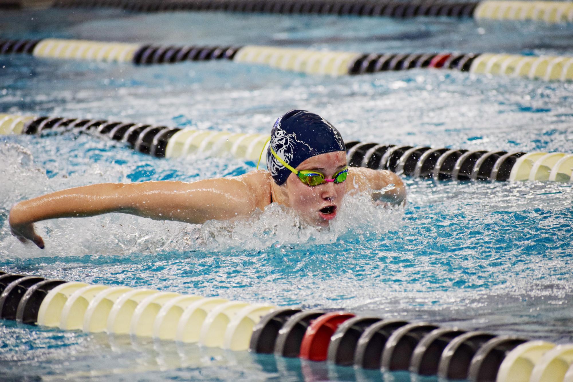 Freshman Claire Simon swims fly during the prelims; she would go on to take second place at the Wildcat Championships in the 100-yard backstroke.