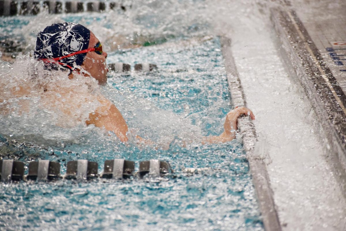 Freshman Jenna Bilut completes an open turn during the prelims.