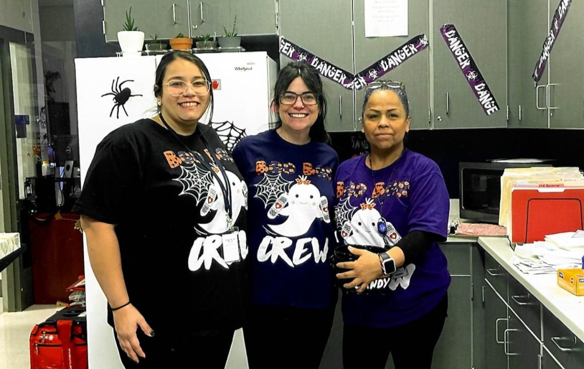 The "Boo Crew" in the nurse's office celebrates Halloween in style. From left to right: Alex Zimmerman, Cathy Collins, and Banjolina Mendoza (Photo courtesy of Alex Zimmerman)