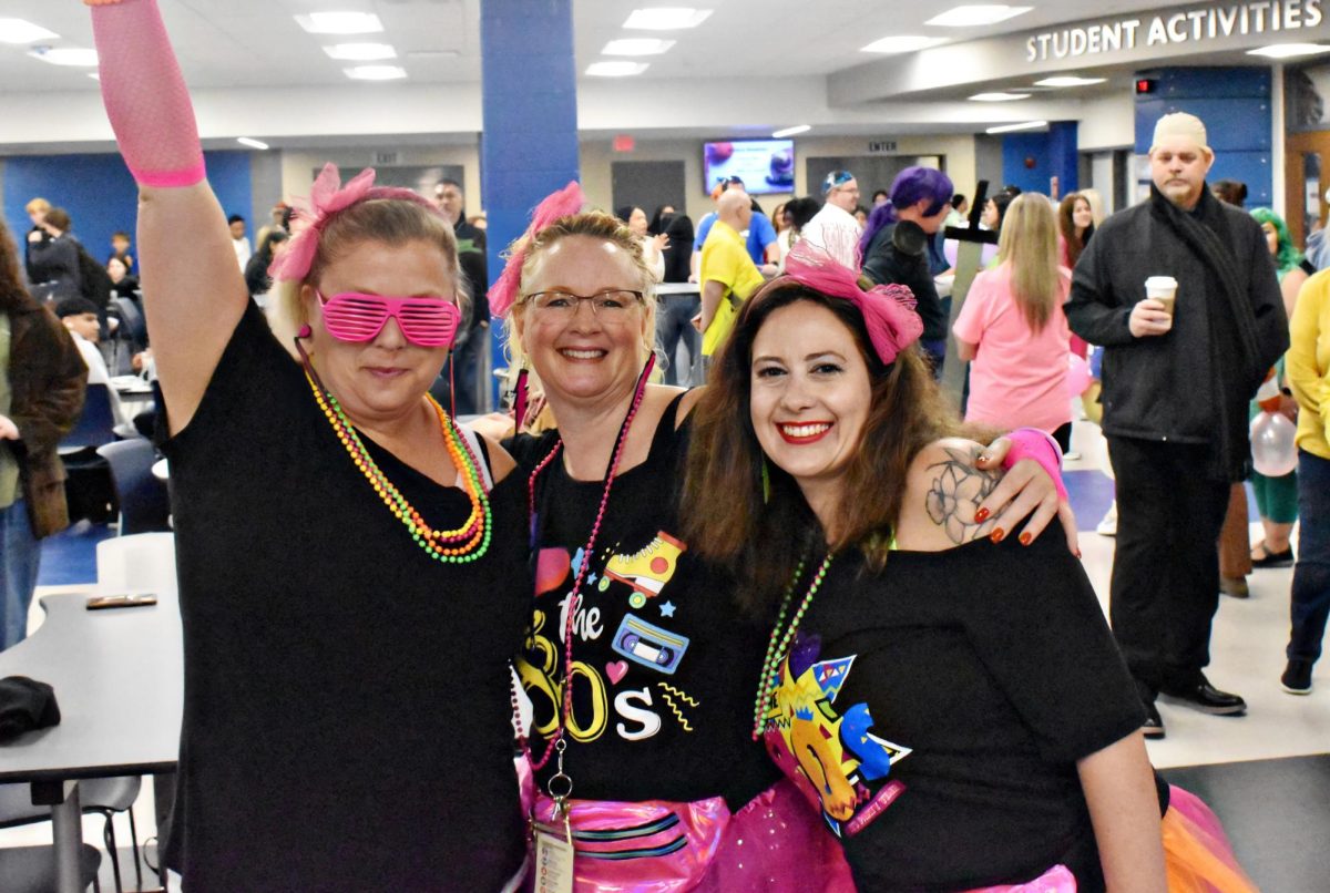 Yes, there does come an age at which trick-or-treating is no longer normal, nor appropriate. Adults, save the trick-or-treating for the kids - find other ways to flaunt the holiday spirit, such as costume contests, like that in which West Chicago Community High School AVID teachers Jen Culbertson, Michelle Walters, and Nicole Stadler participated in Oct. 2024.