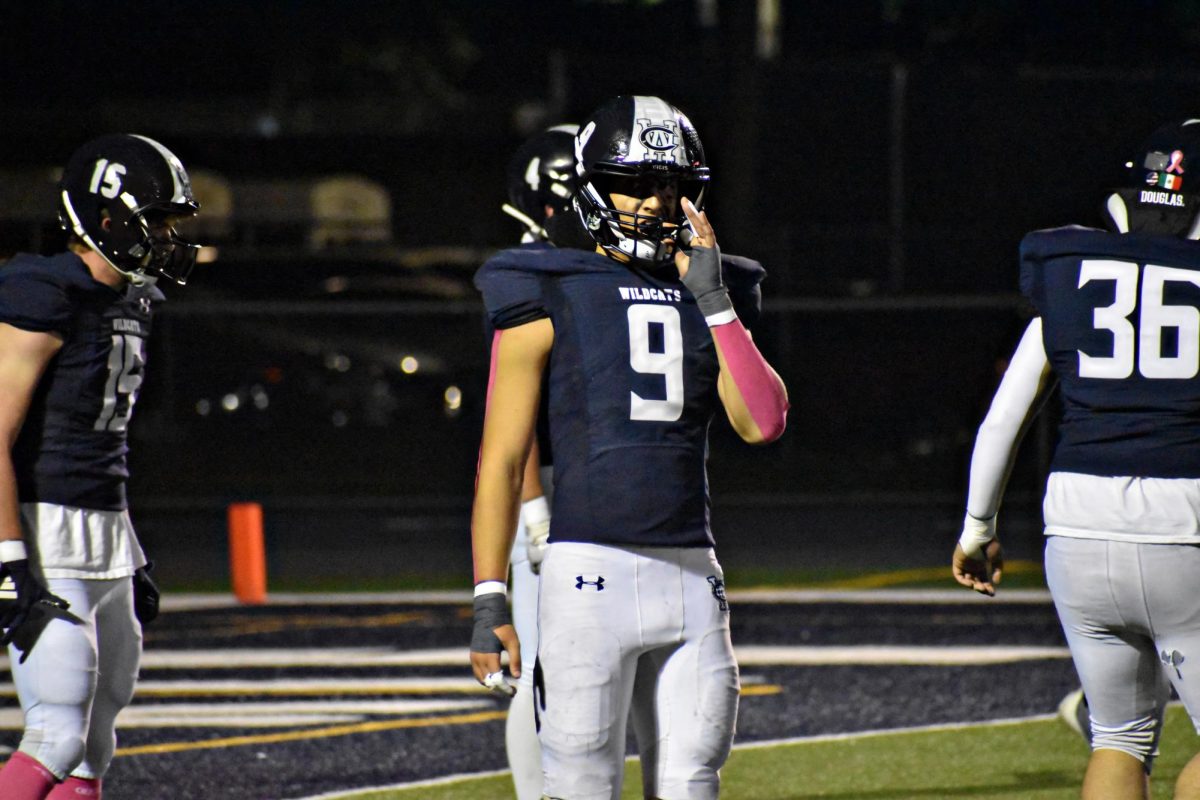 Roman Zolota, a junior, finishes a solid run during the first quarter. 