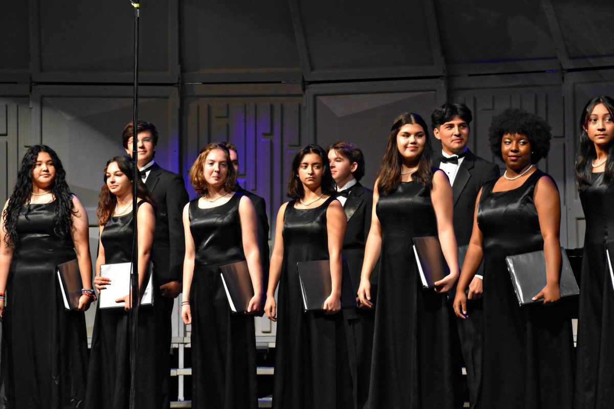 Singers await their cue before staring the next harmony.